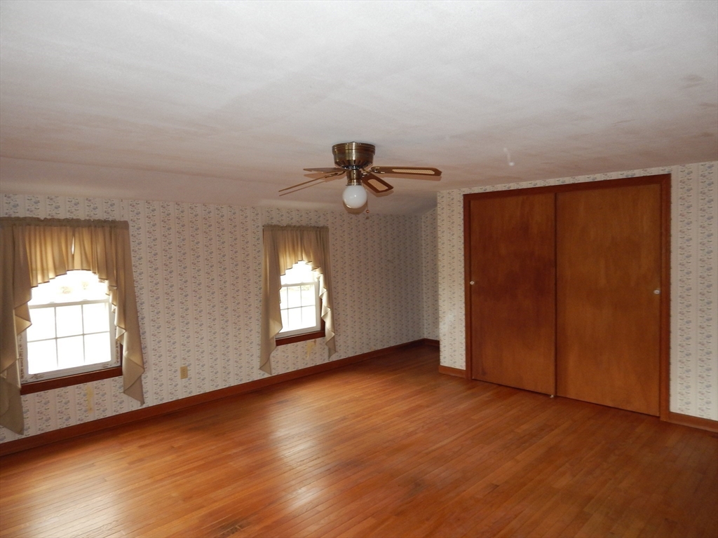 8 Chester Street Montague, MA 01376 - Photo 22 of 32 an empty room with windows and closet