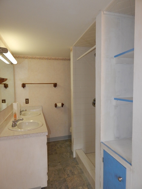 8 Chester Street Montague, MA 01376 - Photo 24 of 32 a bathroom with a sink and a mirror