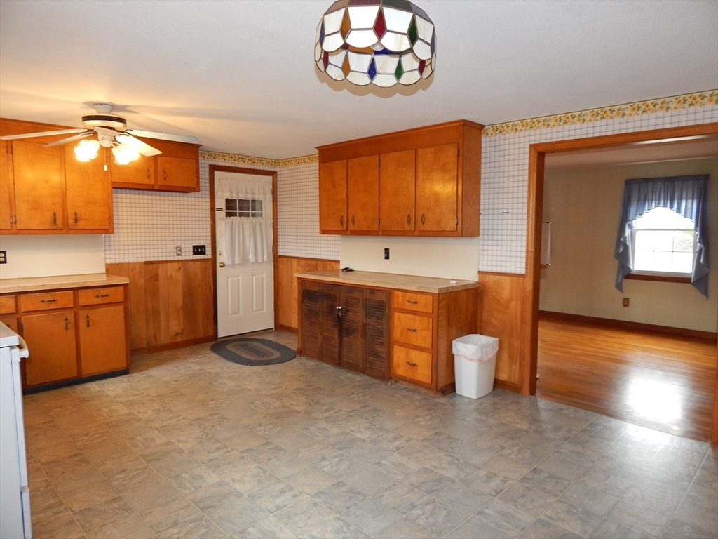 8 Chester Street Montague, MA 01376 - Photo 3 of 32 a kitchen with stainless steel appliances a stove top oven