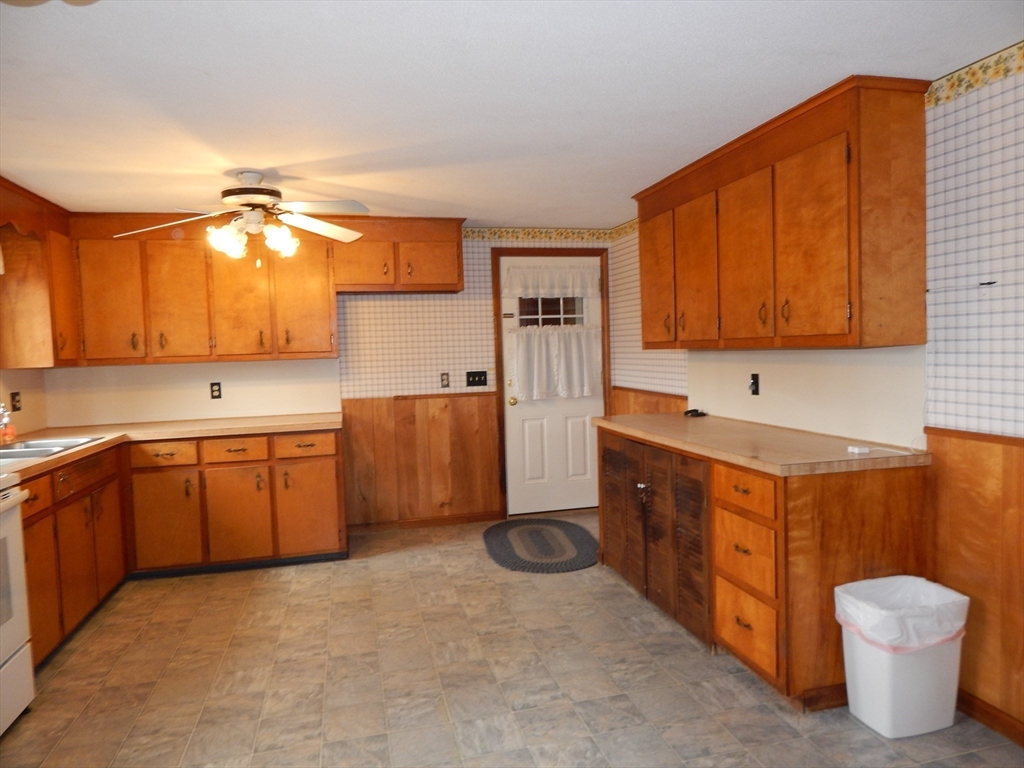 8 Chester Street Montague, MA 01376 - Photo 5 of 32 a kitchen with a sink cabinets and appliances