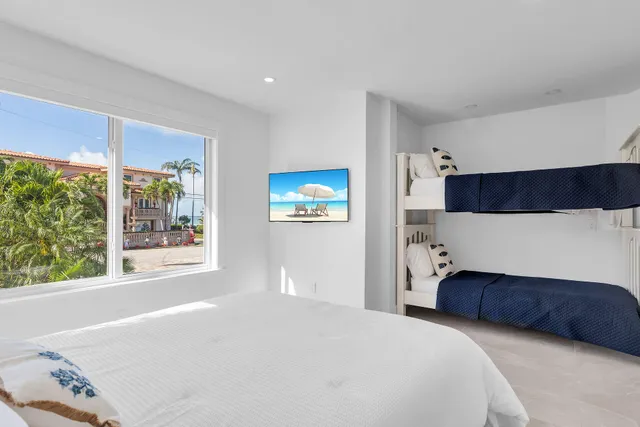 a bathroom with a toilet sink shower and mirror