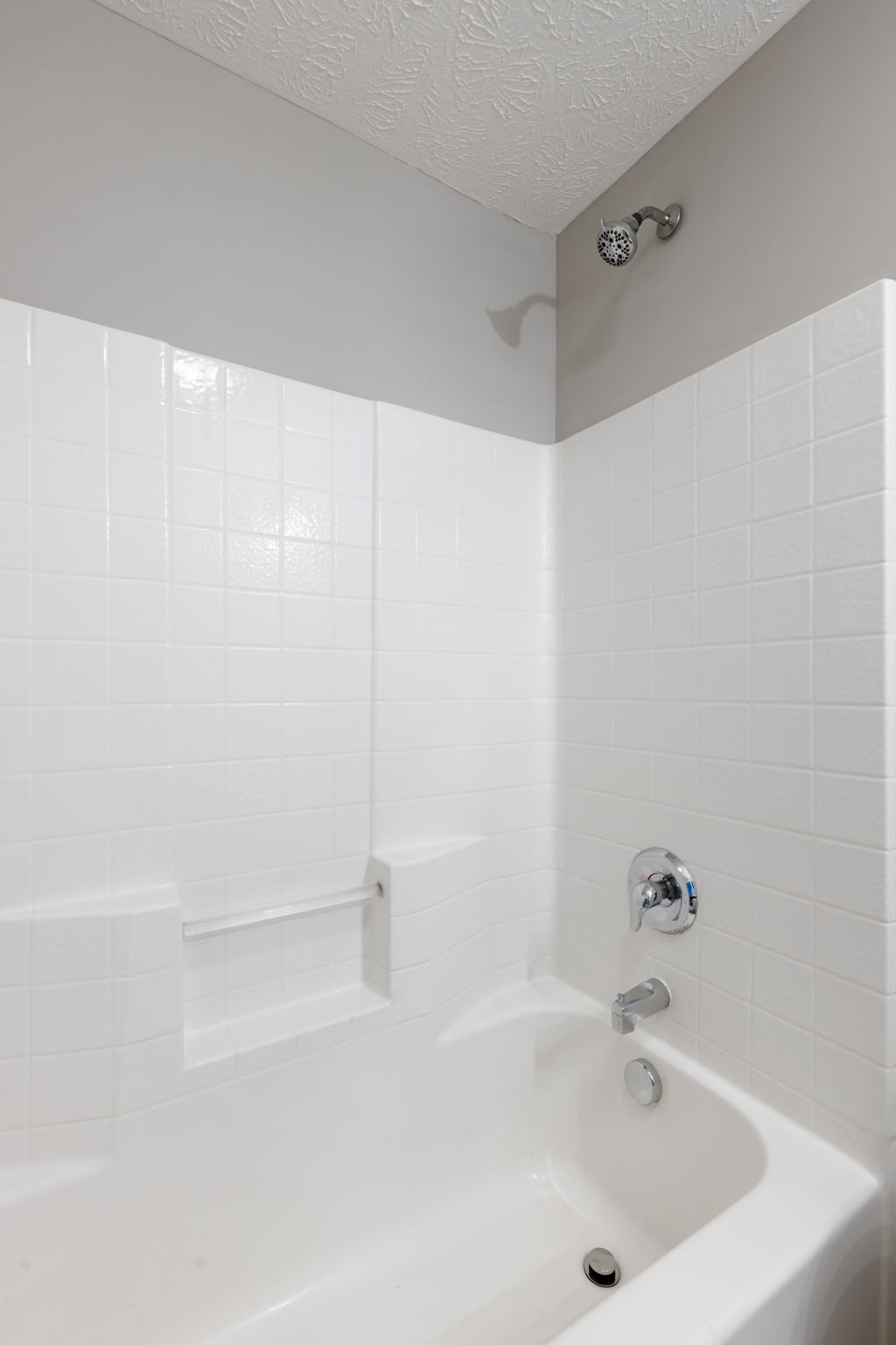 1007 Wells Way Spring Hill, TN 37174 - Photo 12 of 15 a bathroom with a bathtub