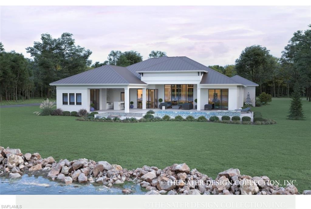 430 Burnt Store Road Cape Coral, FL 33991 - Photo 3 of 7 a front view of a house with a garden