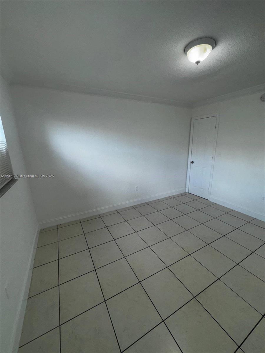 5150 West 12th Avenue, Unit 115 Hialeah, FL 33012 - Photo 12 of 14 a view of room