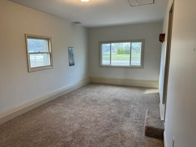 an empty room with a window