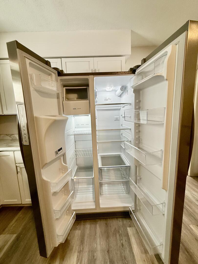 281 East Sprague Street Bement, IL 61813 - Photo 18 of 24 a view of walk in closet with empty racks