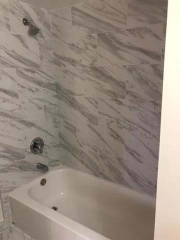 a bathroom with a bathtub
