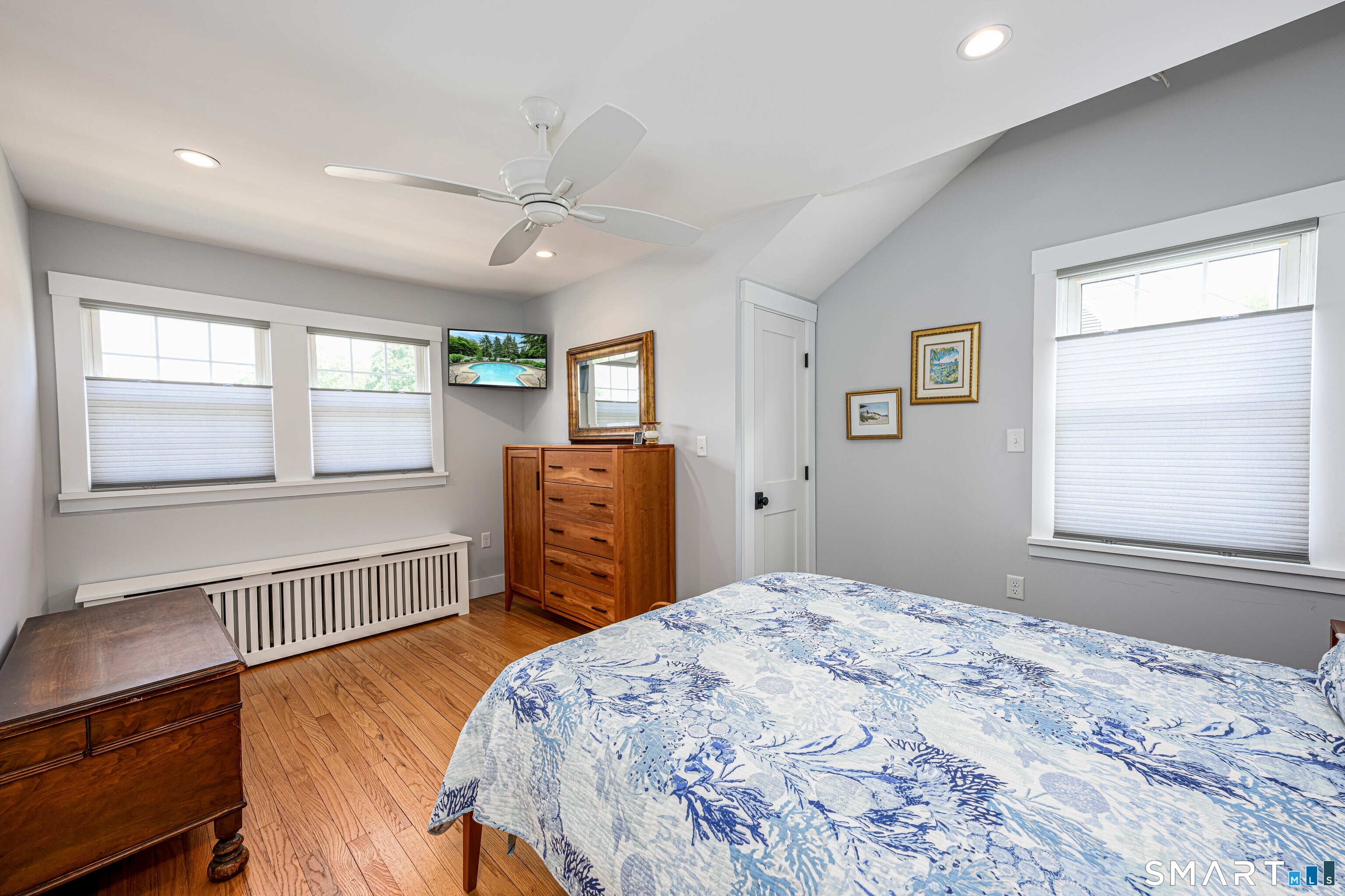77 Prospect Road East Haven, CT 06512 - Photo 19 of 31 Wood floors, split heat/ac unit and notice the covered radiators in all rooms.