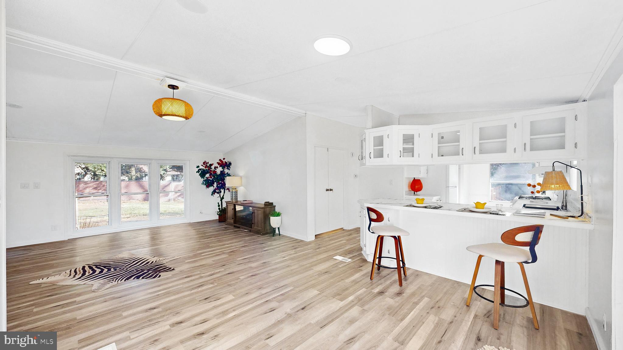 224 Shamrock Avenue Dover, DE 19901 - Photo 4 of 52 a workspace with furniture and wooden floor