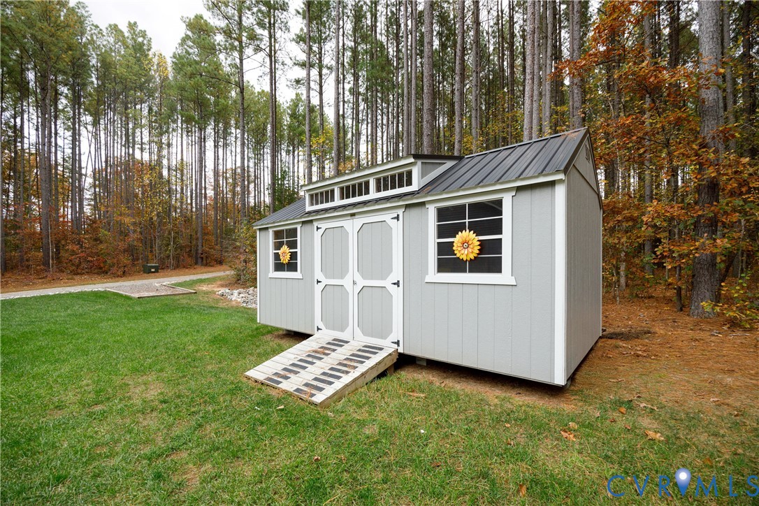 4875 Kimber Lane Gum Spring, VA 23065 - Photo 14 of 48 View of shed featuring view of scattered trees