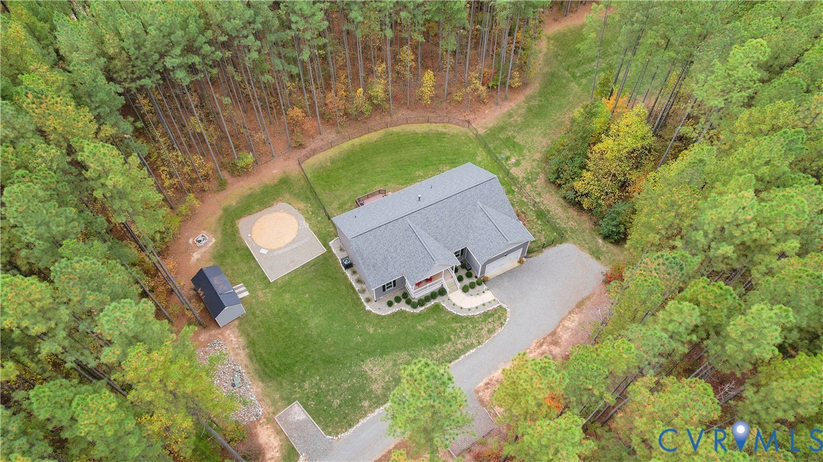 4875 Kimber Lane Gum Spring, VA 23065 - Photo 42 of 48 an aerial view of a house with garden space and street view
