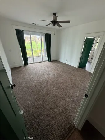 a view of empty room with front door