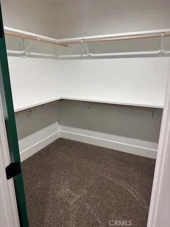 a view of a room with a large window