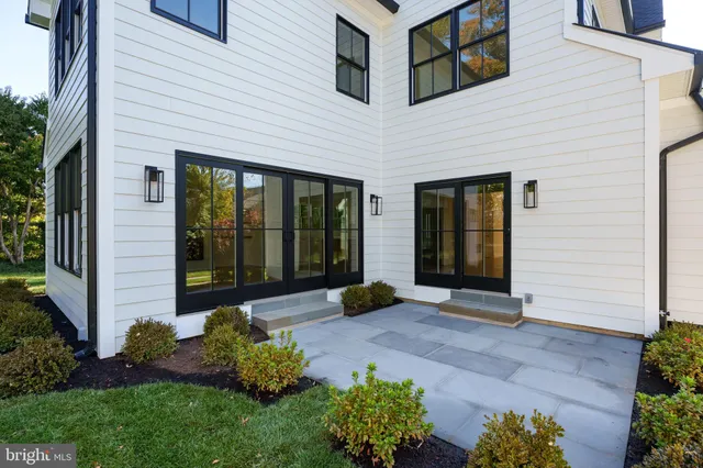 a view of yard with swimming pool and green space