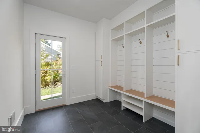 a view of room with window and hardwood floor