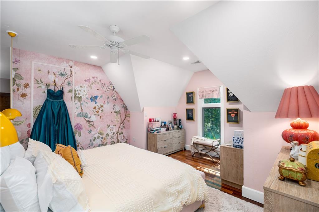 311 Derry Ridge Road Ligonier, PA 15658 - Photo 25 of 42 a bed room with a bed and a large mirror