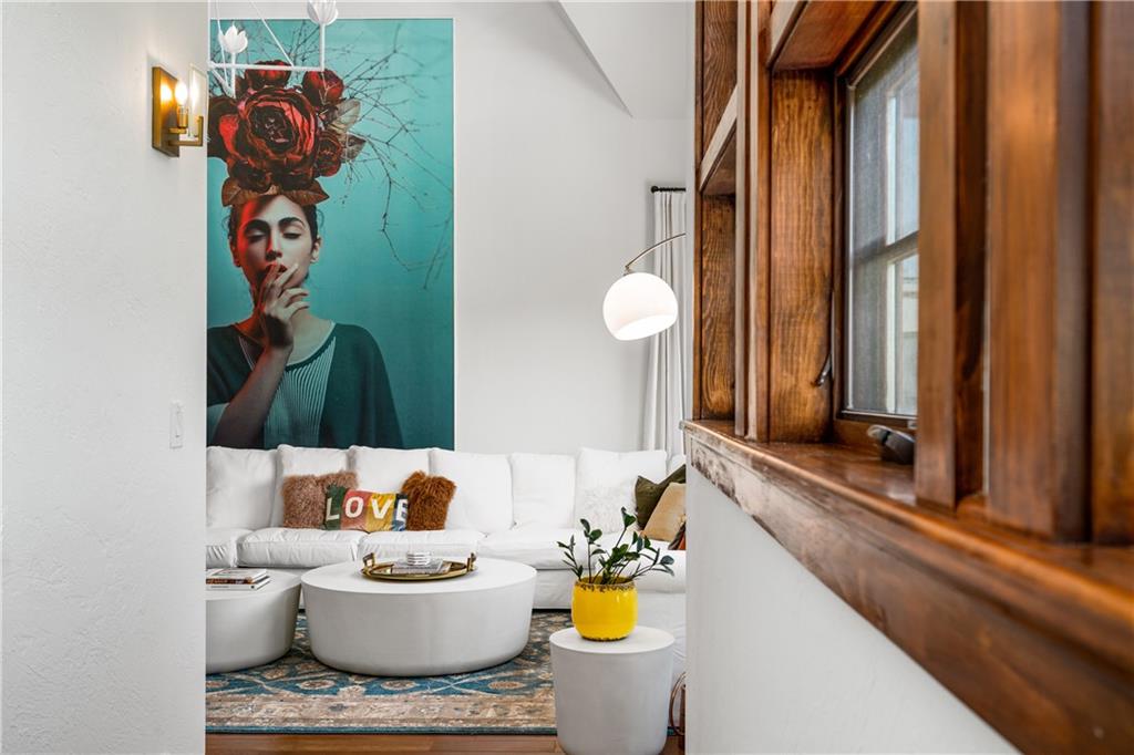 311 Derry Ridge Road Ligonier, PA 15658 - Photo 4 of 42 a living room with furniture and floor to ceiling window