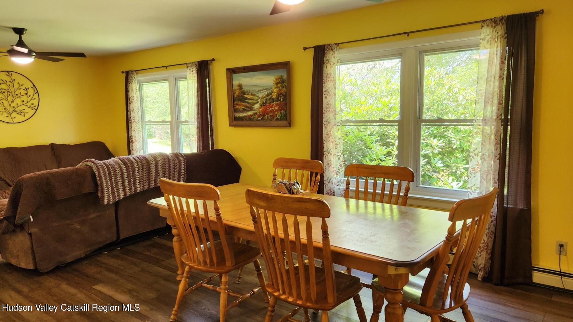 1262 County Road 2 Olivebridge, NY 12461 - Photo 11 of 42 a view of a dining room with furniture and a window