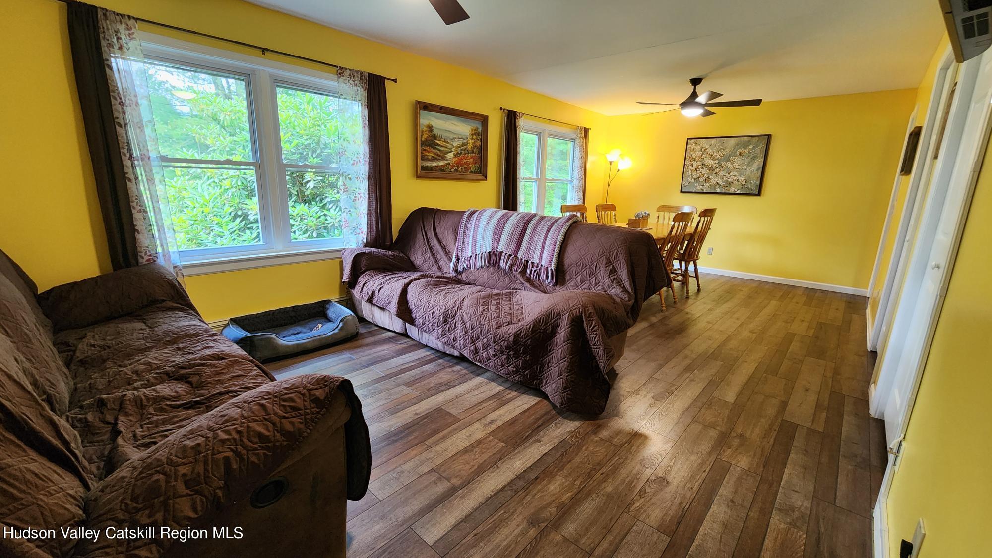 1262 County Road 2 Olivebridge, NY 12461 - Photo 12 of 42 a living room with furniture and a window