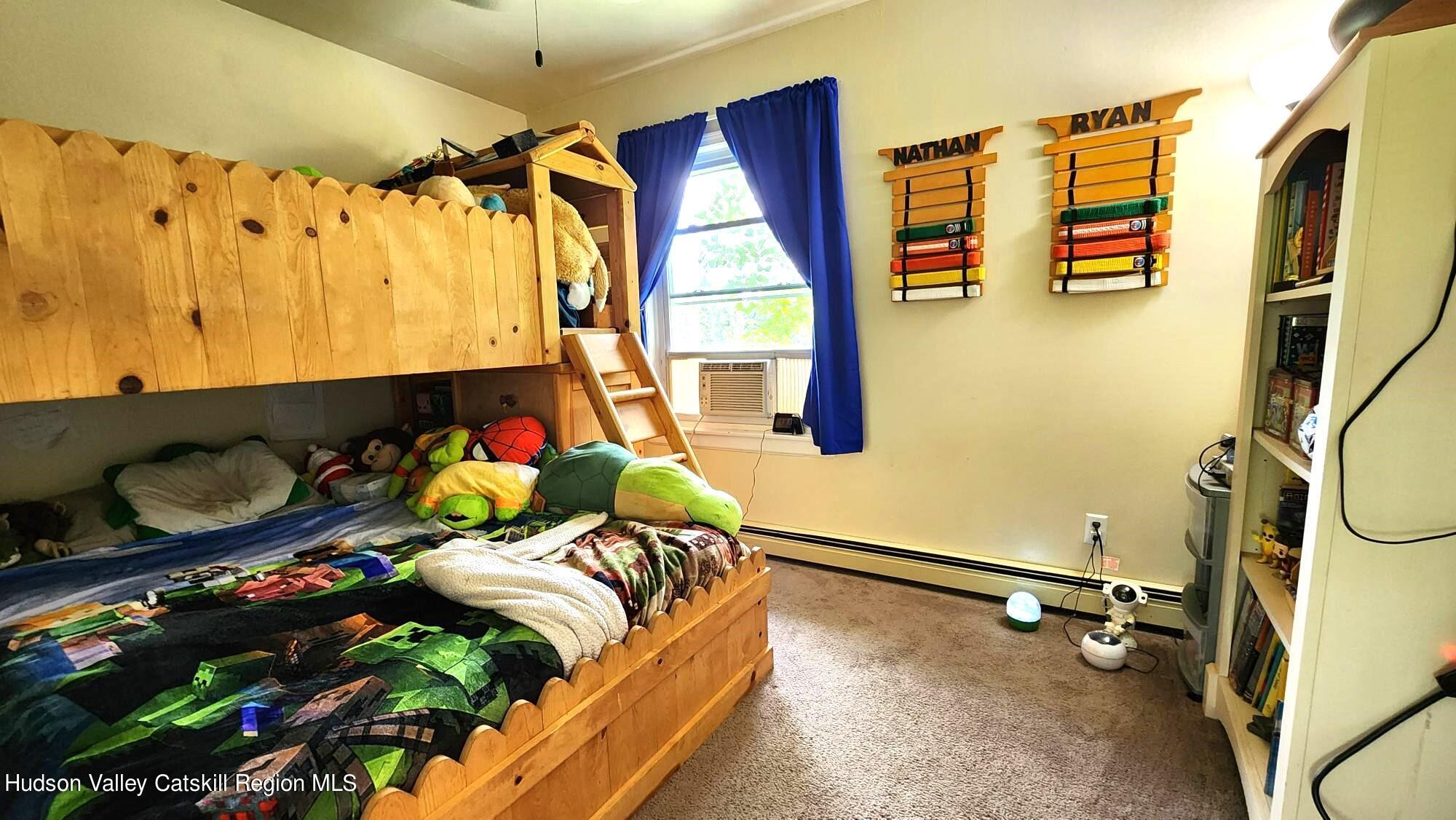 1262 County Road 2 Olivebridge, NY 12461 - Photo 19 of 42 a bedroom with bed and a window