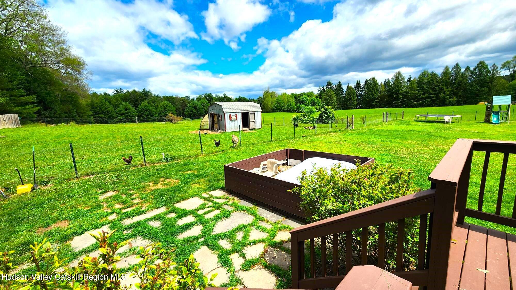 1262 County Road 2 Olivebridge, NY 12461 - Photo 27 of 42 a view of a two chairs in a yard