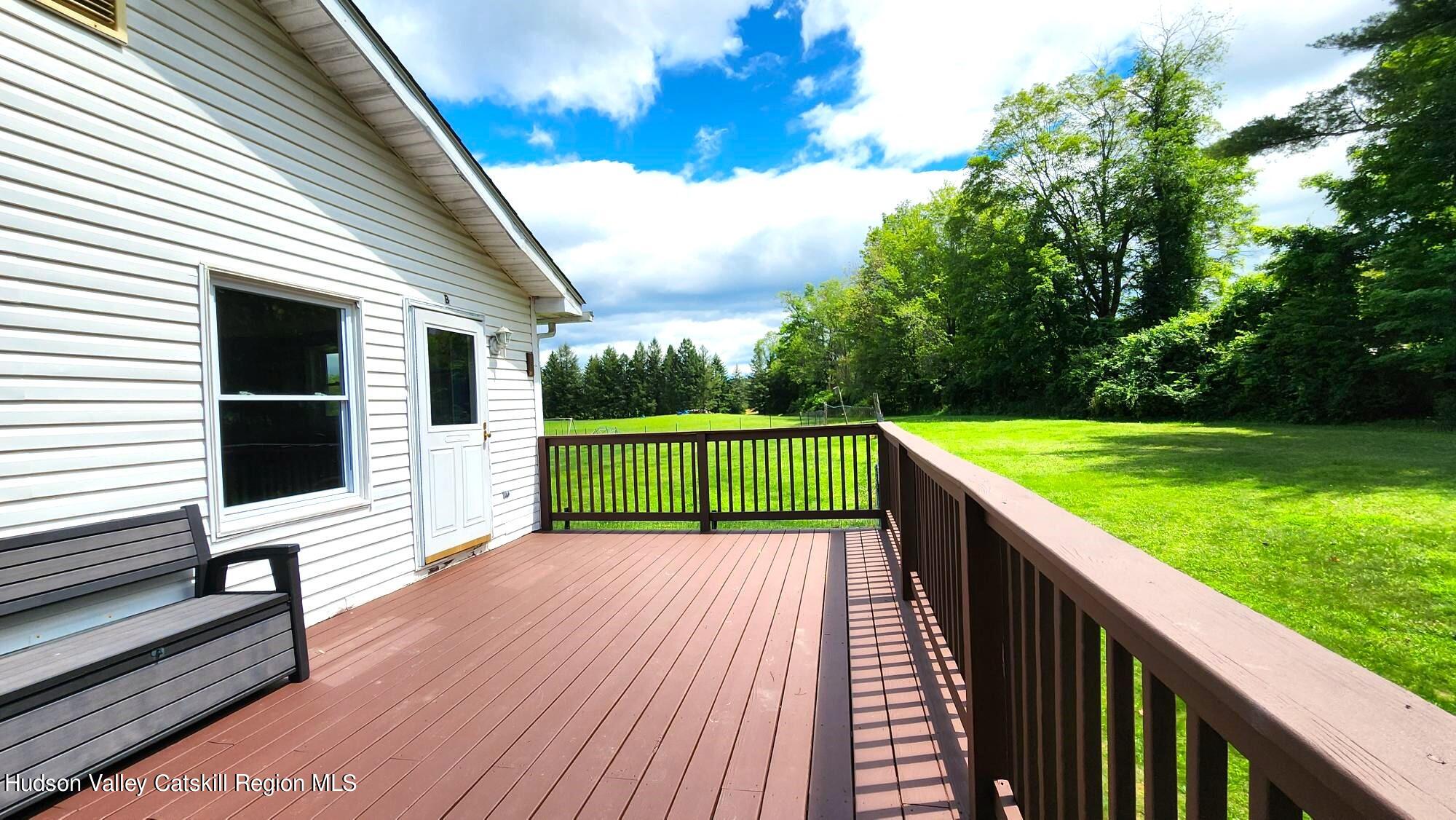 1262 County Road 2 Olivebridge, NY 12461 - Photo 30 of 42 a view of a porch with wooden floor and fence