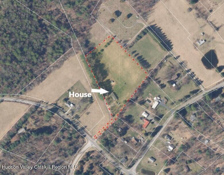 1262 County Road 2 Olivebridge, NY 12461 - Photo 36 of 42 a vase of flowers sitting on a floor