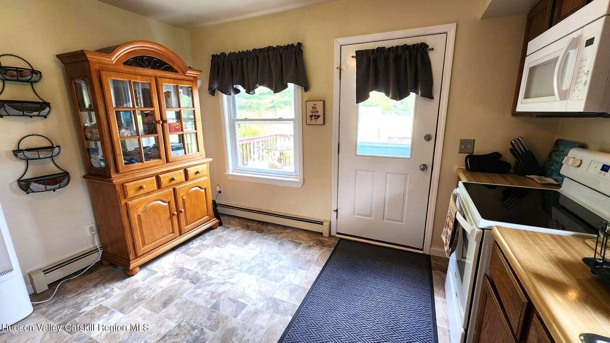 1262 County Road 2 Olivebridge, NY 12461 - Photo 9 of 42 a view of an entryway with wooden floor and door
