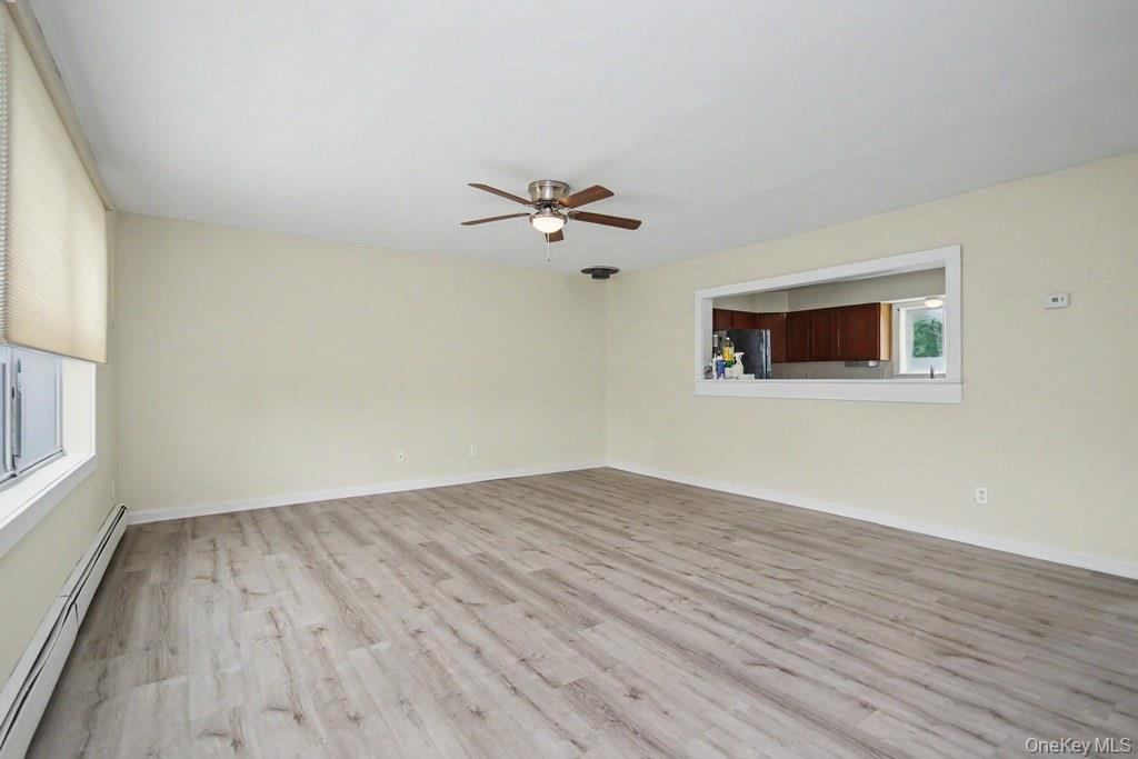 236 Bullville Road Montgomery, NY 12549 - Photo 9 of 29 Living room with connection to kitchen