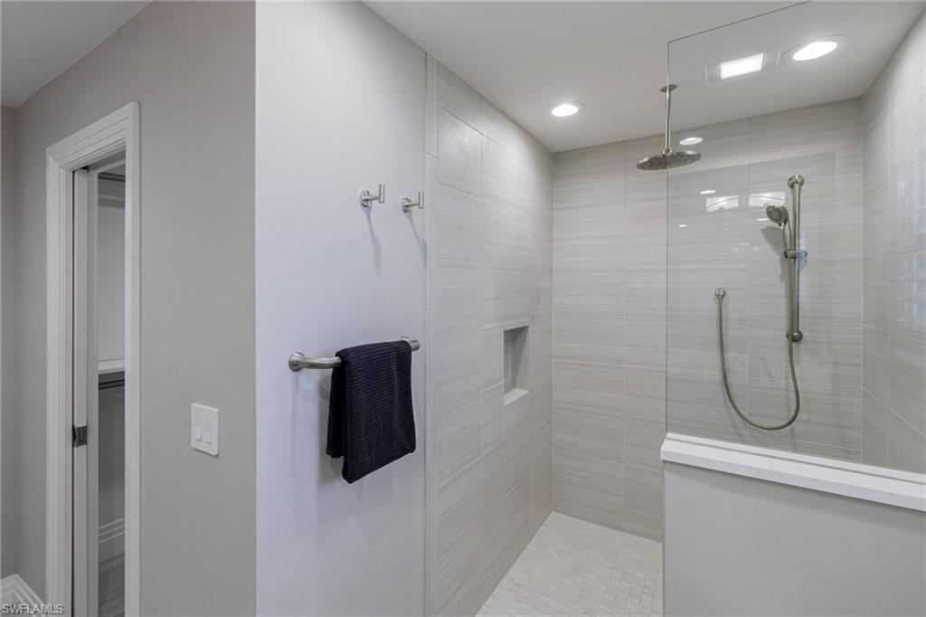 3720 Parkview Way Naples, FL 34103 - Photo 15 of 29 Bathroom with tiled shower