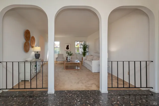 a view of living room and dining room