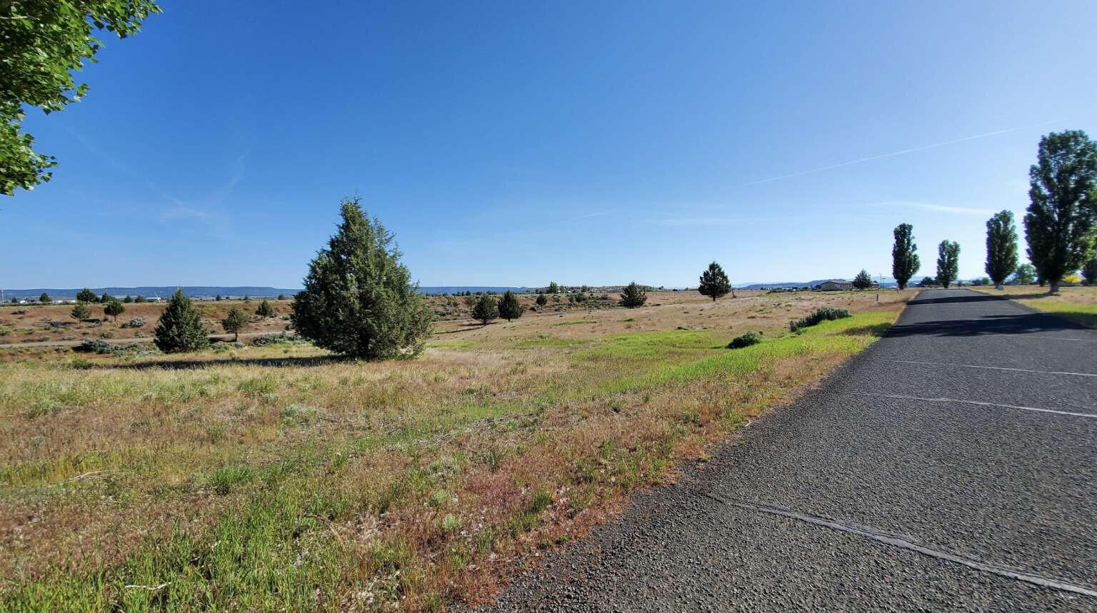 Shasta View Drive Alturas, CA 96101 - Photo 22 of 26 a view of a road with an ocean view