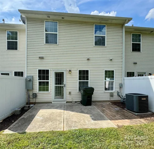 a view of house with yard