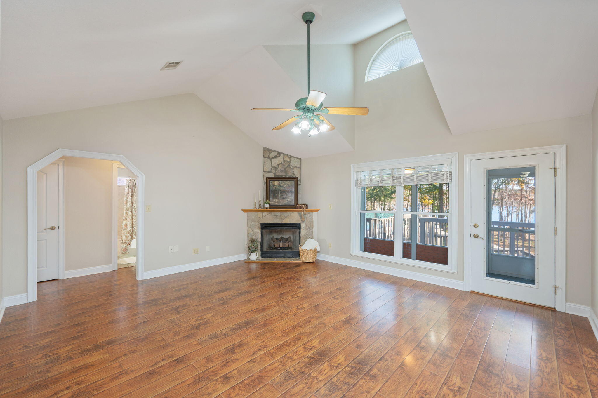 516 Blue Pond Circle Ponce de Leon, FL 32455 - Photo 3 of 39 a view of an empty room with a fireplace and a window