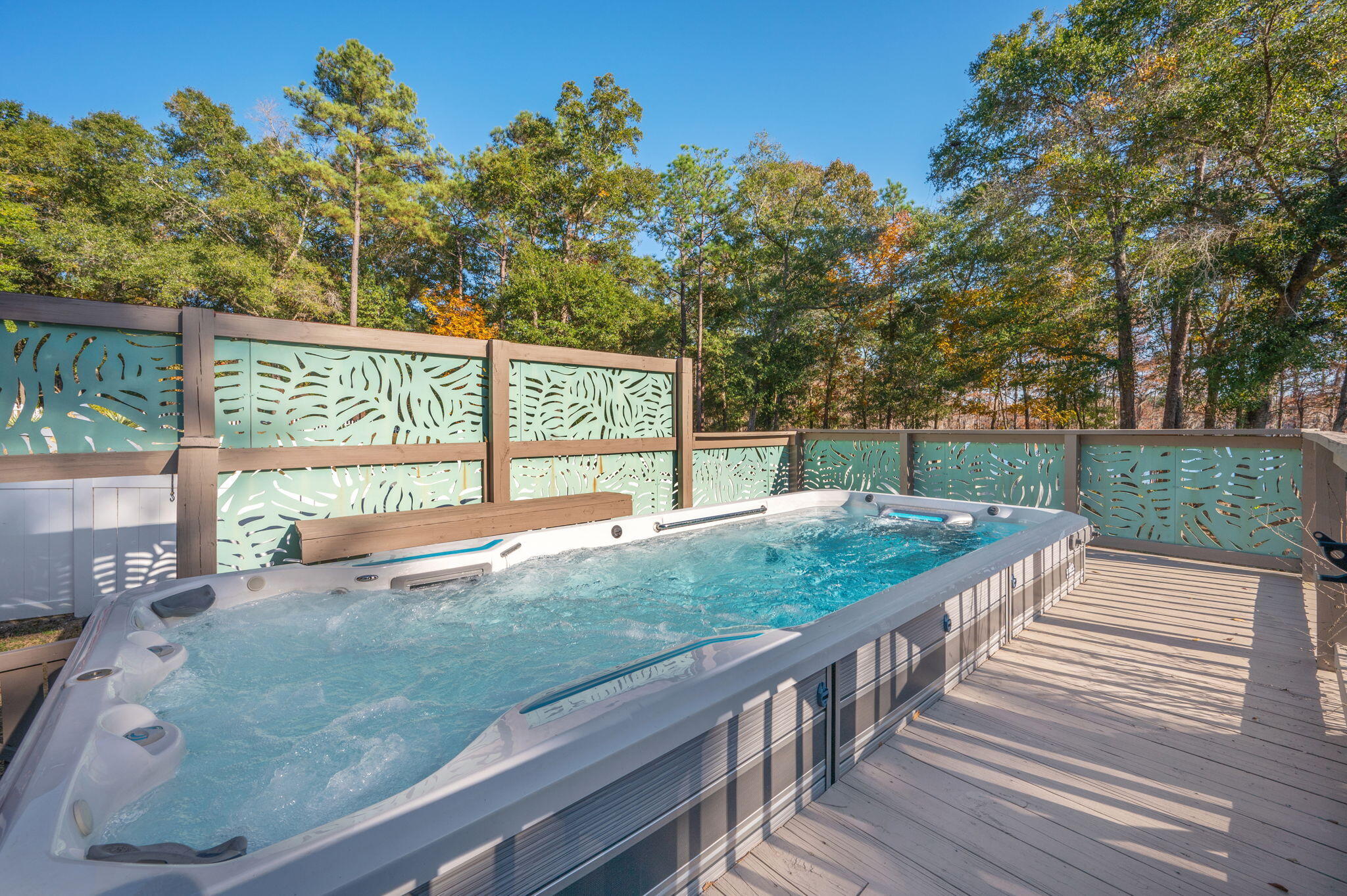 516 Blue Pond Circle Ponce de Leon, FL 32455 - Photo 5 of 39 a view of a backyard and deck