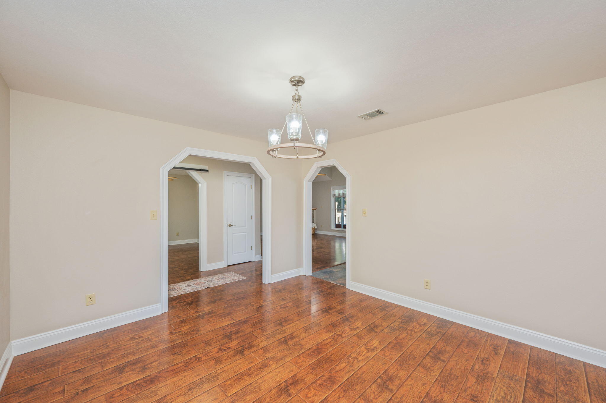 516 Blue Pond Circle Ponce de Leon, FL 32455 - Photo 8 of 39 wooden floor in an empty room