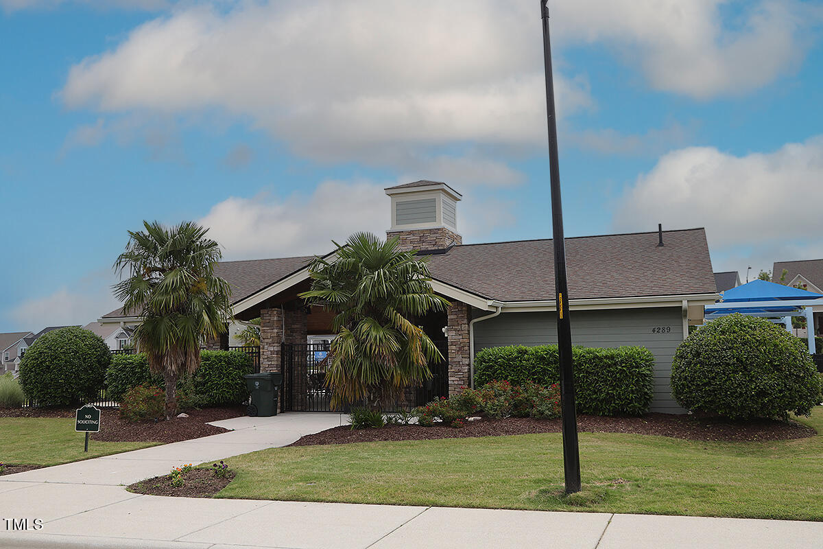4416 Walker Hallow Street Raleigh, NC 27616 - Photo 26 of 28 a front view of a house with garden