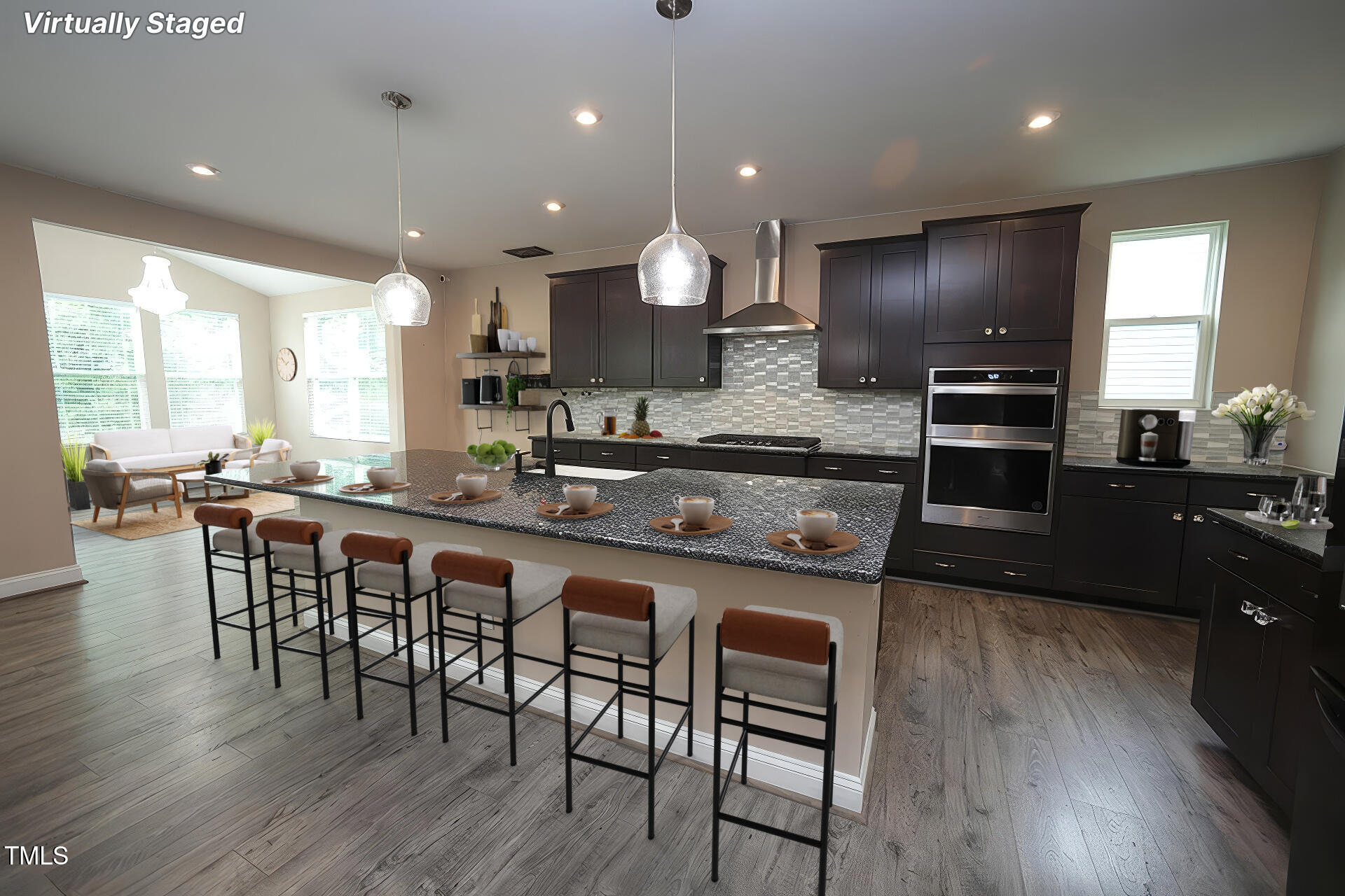 4416 Walker Hallow Street Raleigh, NC 27616 - Photo 6 of 28 a large kitchen with a table and chairs