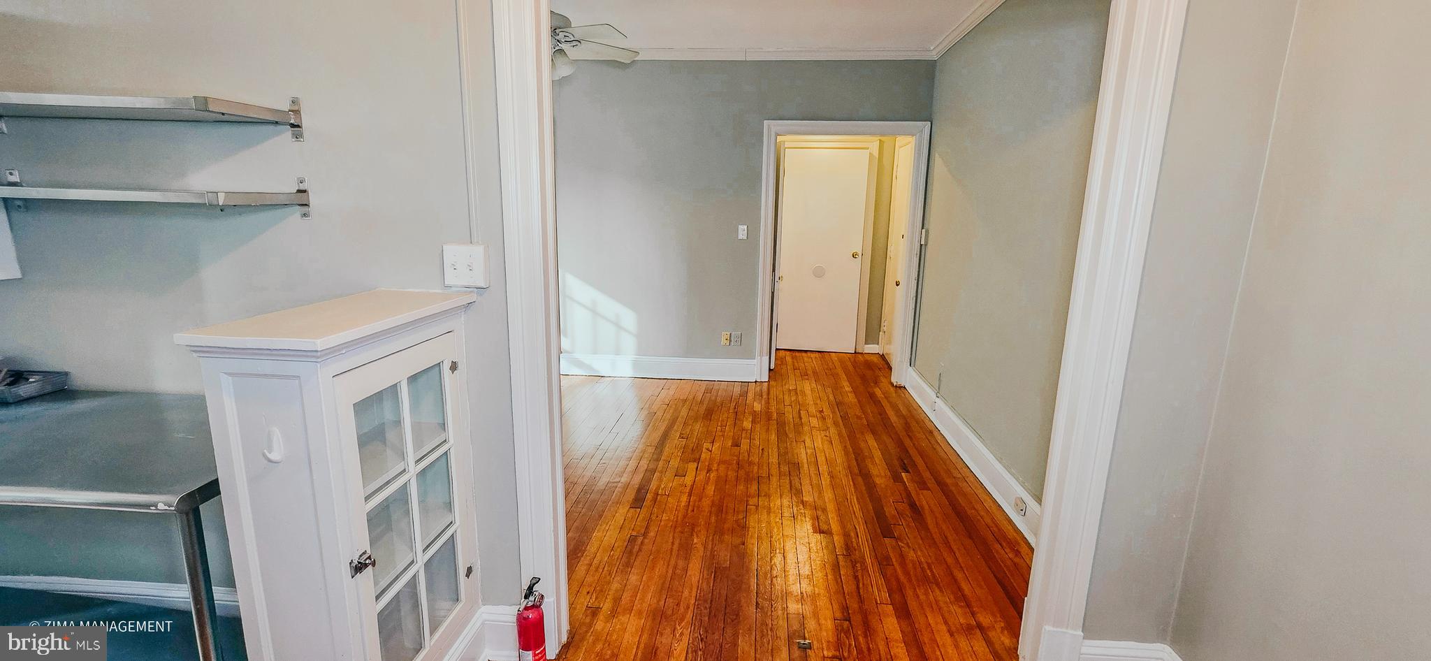 1954 Columbia Road Northwest, Unit 104 Washington, DC 20009 - Photo 16 of 17 a very nice looking room with wooden floor