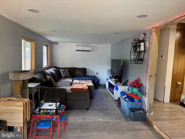 a living room with furniture and a couch