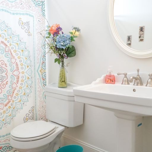 1895 Zeb Warren Road Cookeville, TN 38506 - Photo 28 of 70 a bathroom with a toilet sink and mirror
