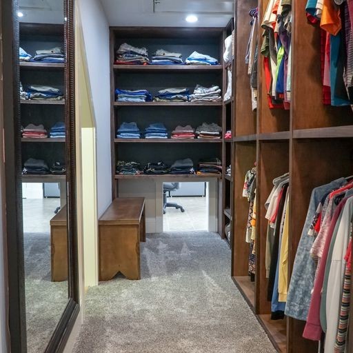 1895 Zeb Warren Road Cookeville, TN 38506 - Photo 47 of 70 a view of walk in closet with clothes and shoes