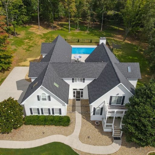1895 Zeb Warren Road Cookeville, TN 38506 - Photo 6 of 70 a aerial view of a house with a yard table and chairs