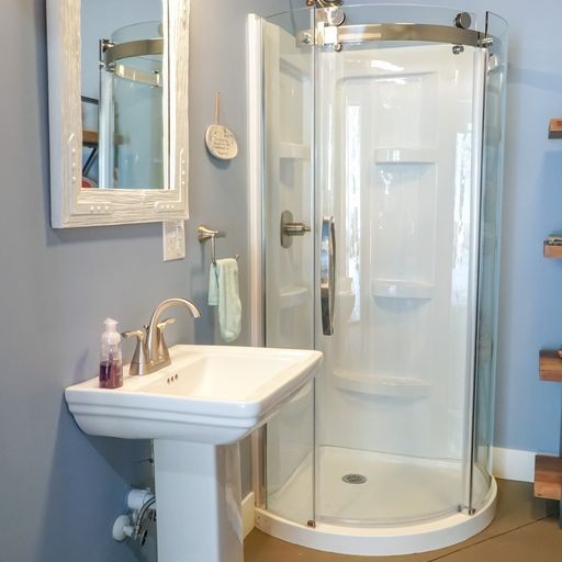 1895 Zeb Warren Road Cookeville, TN 38506 - Photo 68 of 70 a bathroom with a shower a mirror and a sink