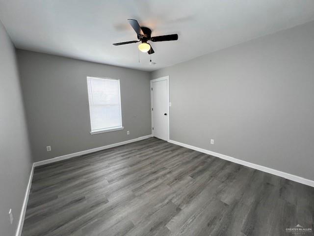 2912 Ozark Avenue McAllen, TX 78504 - Photo 13 of 21 an empty room with wooden floor ceiling fan and windows