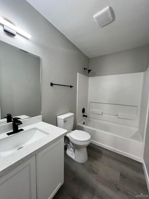 2912 Ozark Avenue McAllen, TX 78504 - Photo 14 of 21 a bathroom with a sink toilet vanity and tub