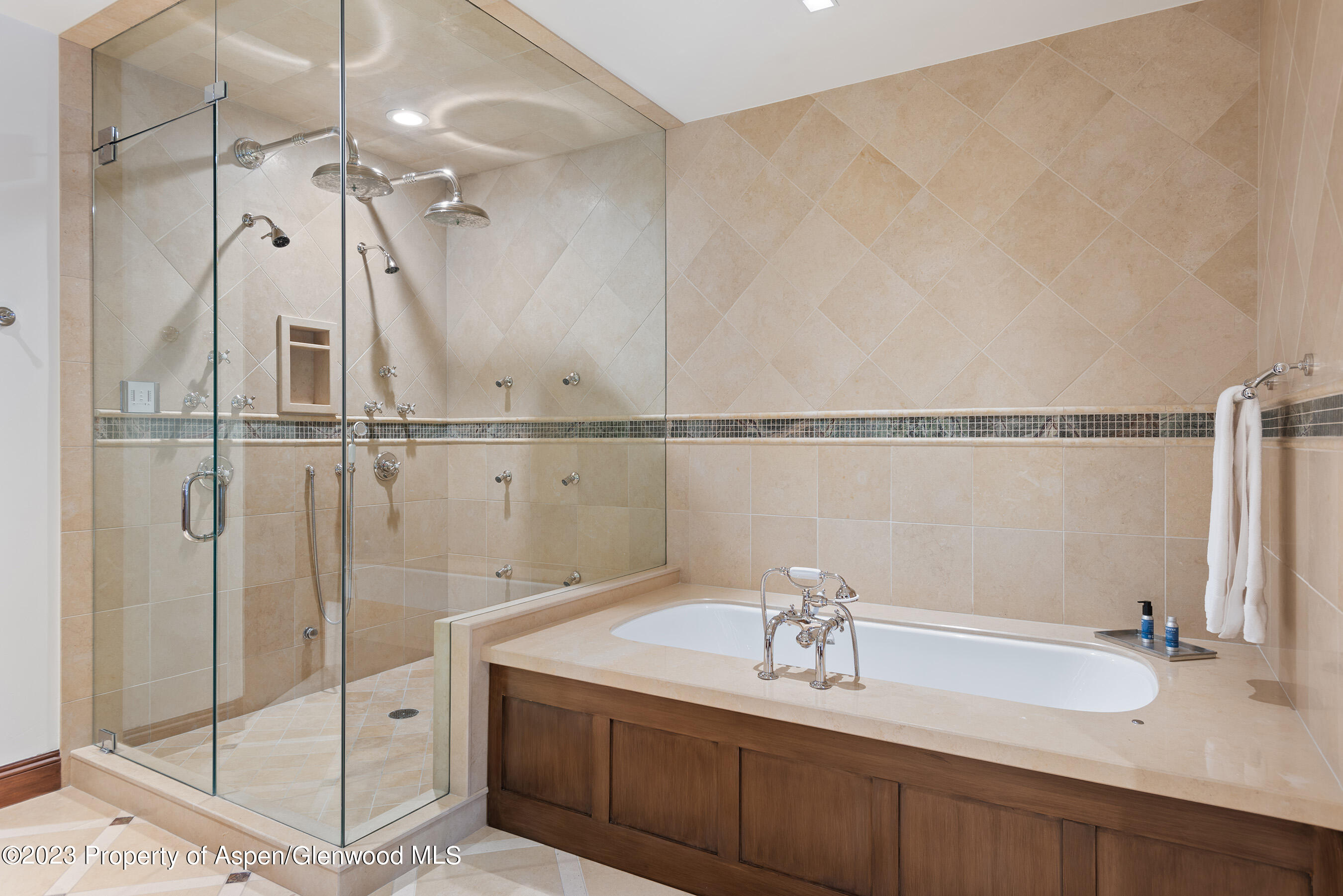1819 Maroon Creek Road Aspen, CO 81611 - Photo 28 of 43 a bathroom with a sink and a mirror