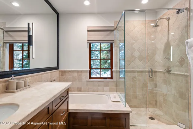 a utility room with sink dryer and washer