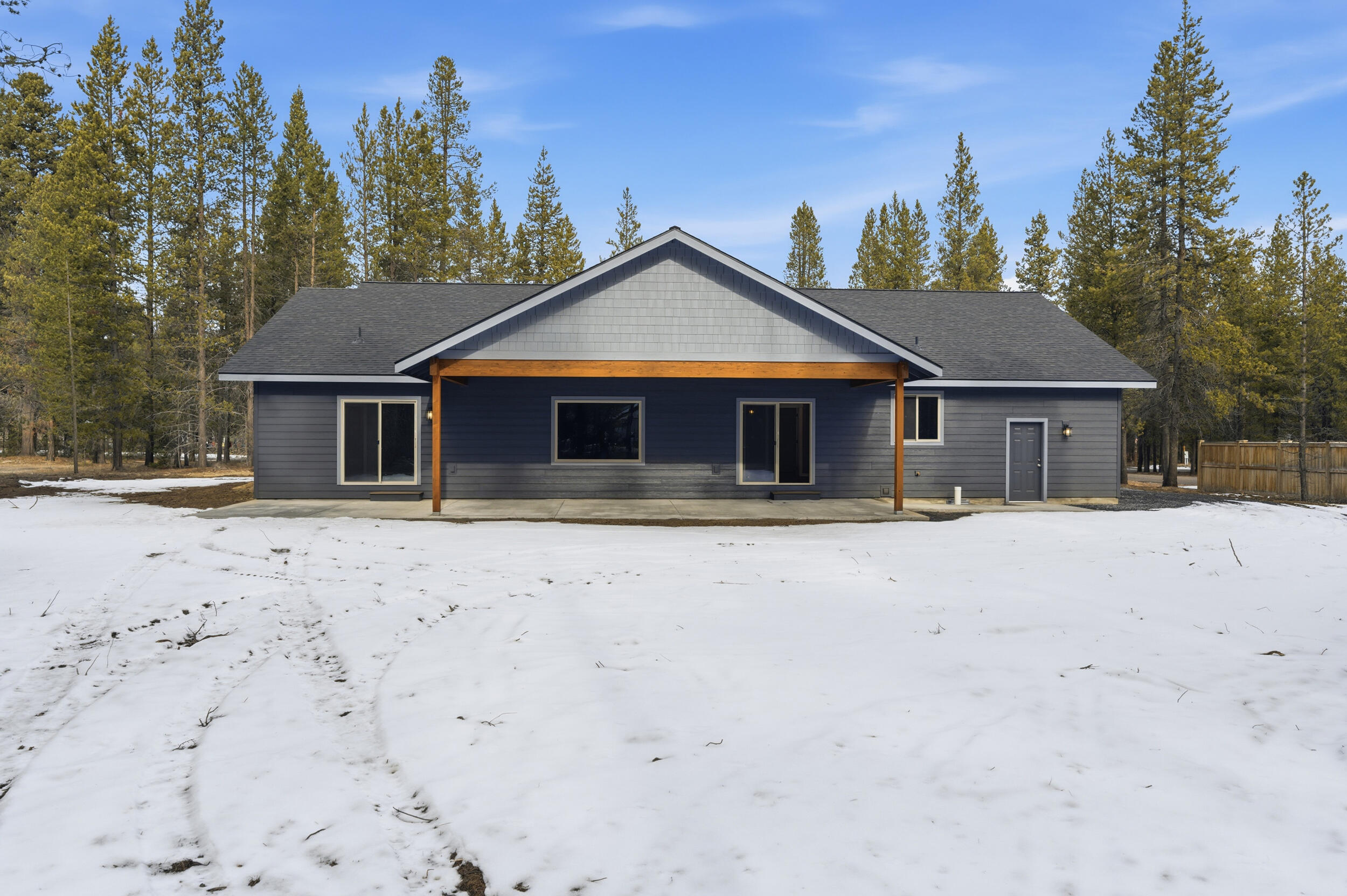 16083 Dyke Road, Unit 9 La Pine, OR 97739 - Photo 44 of 53 a front view of a house with a yard