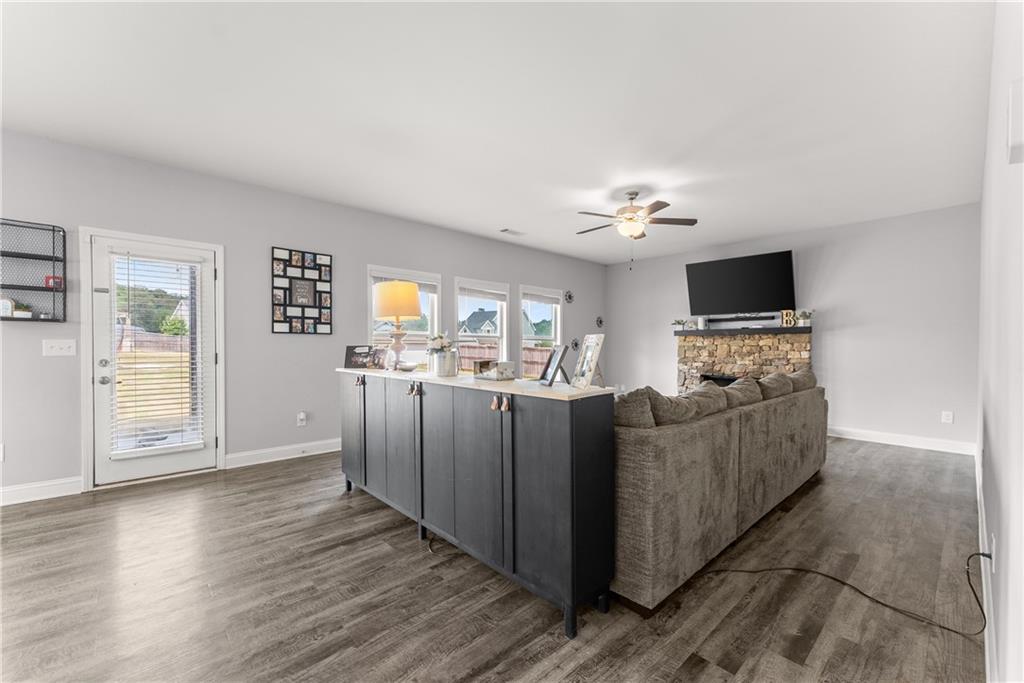 6401 Vista Point Lula, GA 30554 - Photo 17 of 58 a living room with furniture and a flat screen tv